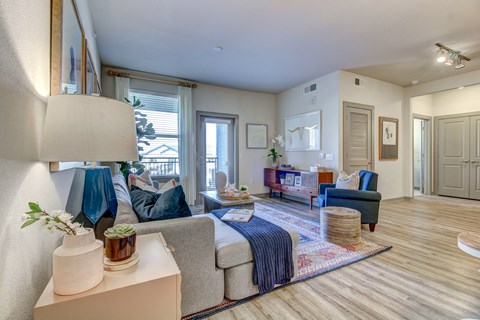 a living room with a couch and a chair