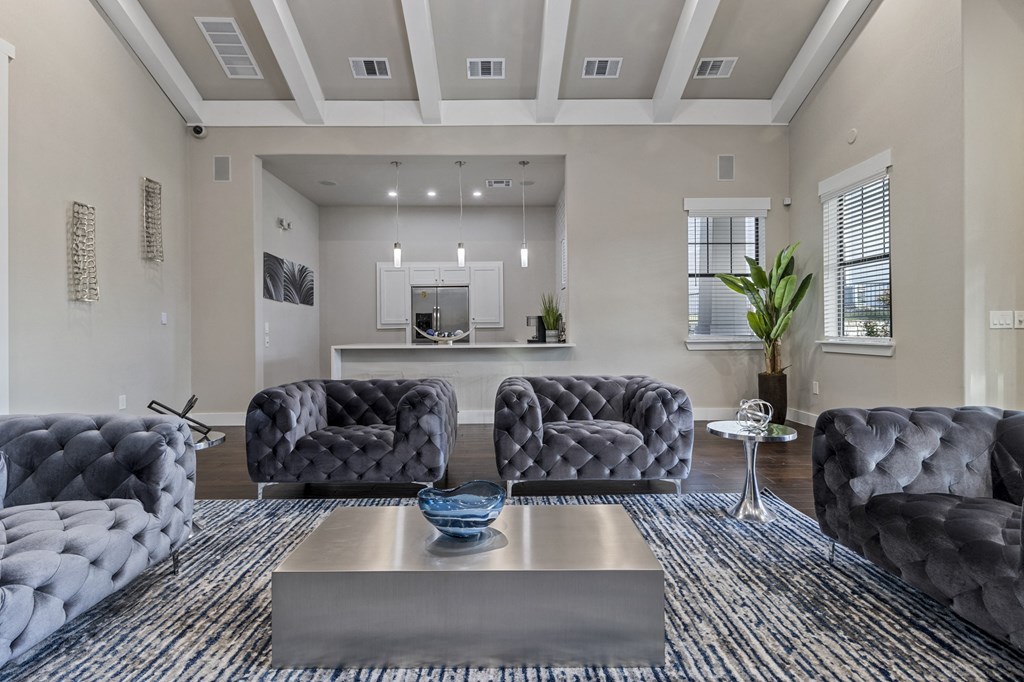 a living room with couches and a coffee table