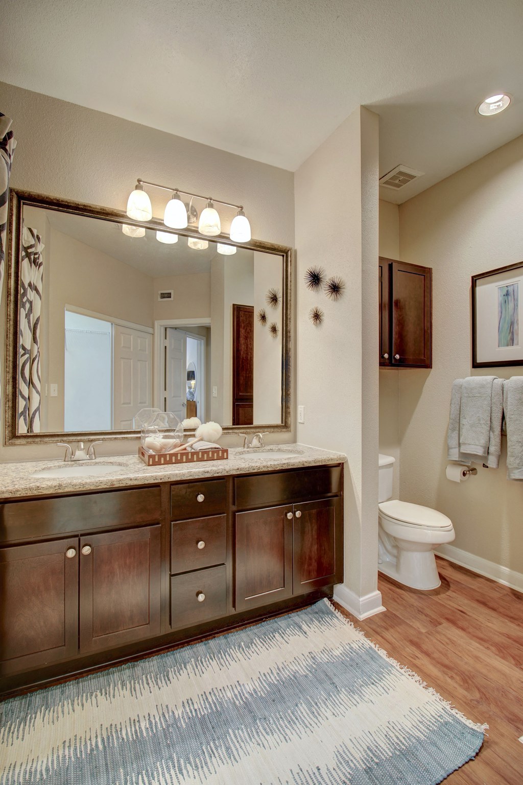 a bathroom with a large mirror