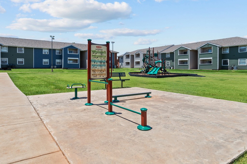 a playground at the whispering winds apartments in pearland, tx