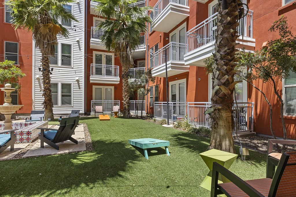 our apartments have a spacious courtyard with seating and tables