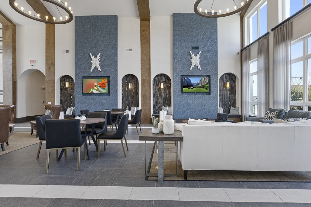 a restaurant with blue and white walls and tables and chairs