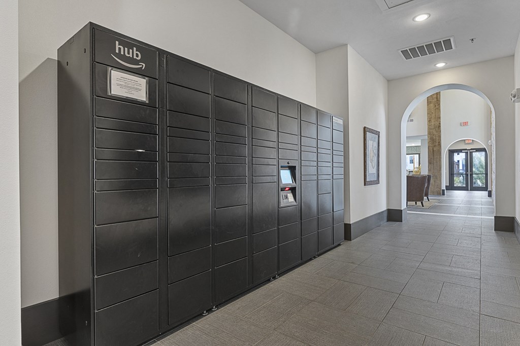 a large group of lockers in a hallway of a building