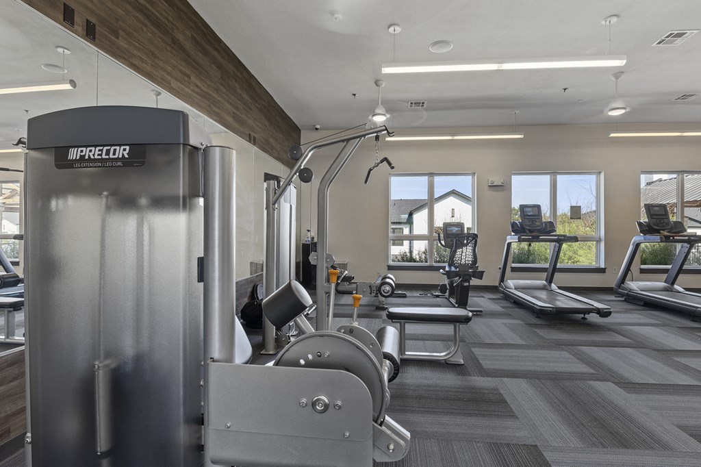 the gym at the flats at big tex apartments