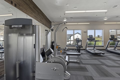 the gym at the flats at big tex apartments