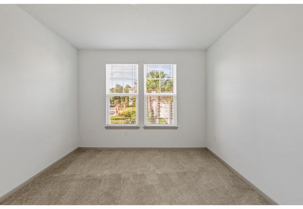 an empty room with a window in it