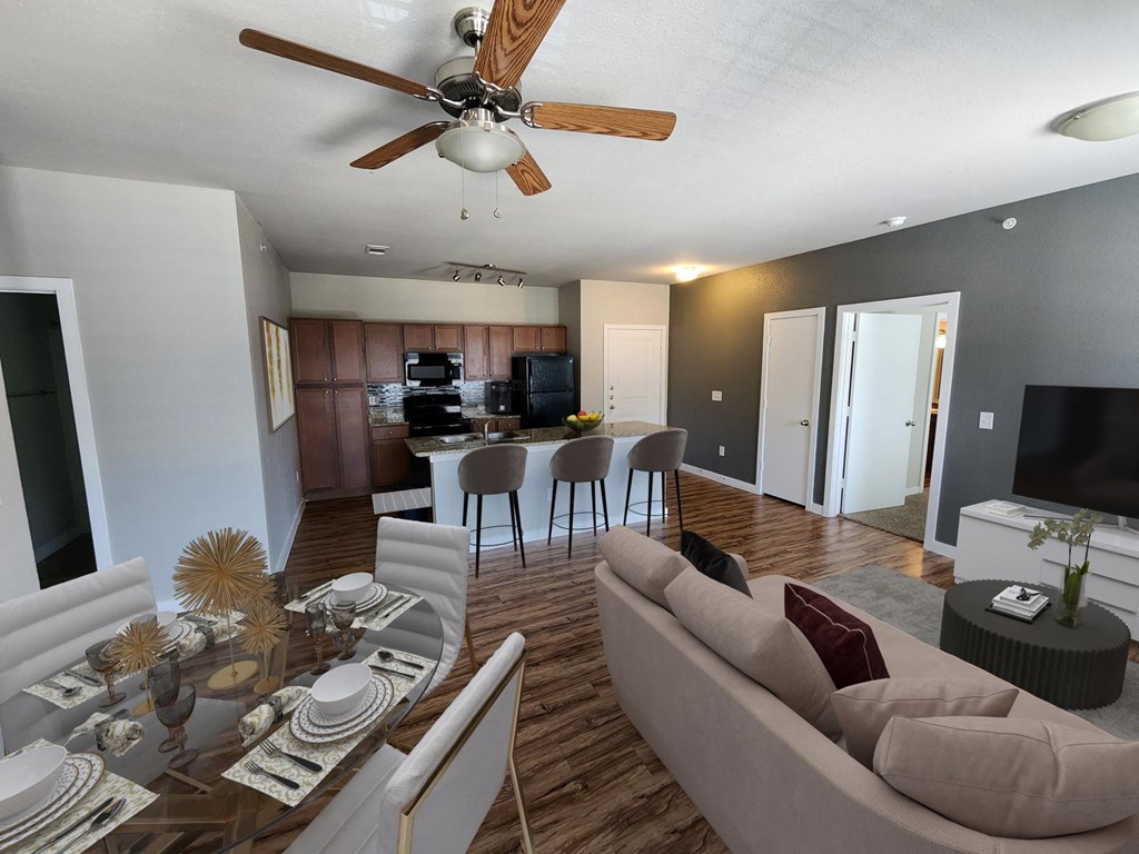a view of the living room and kitchen from the balcony