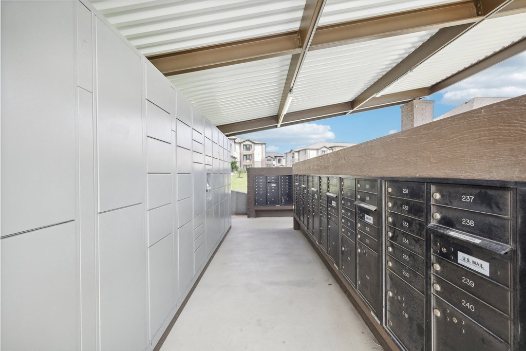 the kitchen has plenty of cabinets and stainless steel appliances