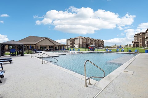 the preserve at ballantyne commons community swimming pool with buildings