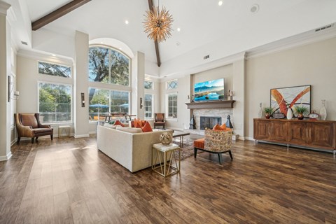 a living room with a couch and a fireplace