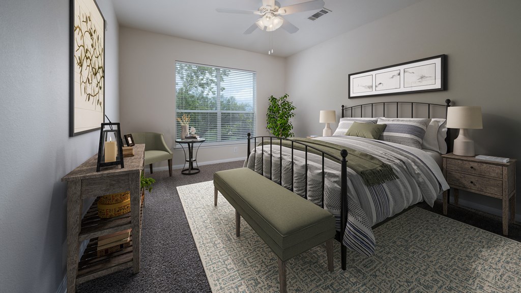 a bedroom with a bed and a dresser and a window