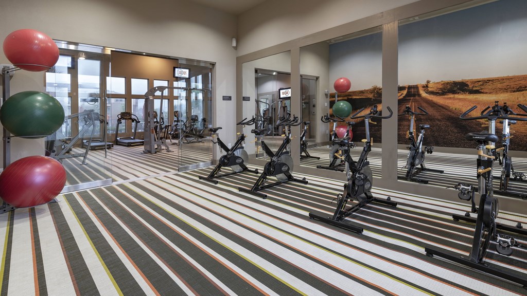 a fitness room with treadmills and other exercise equipment at the resort at governors