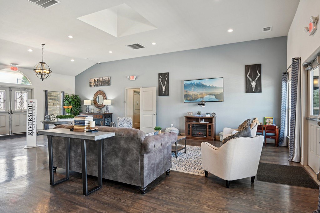 a living room with a couch and a table