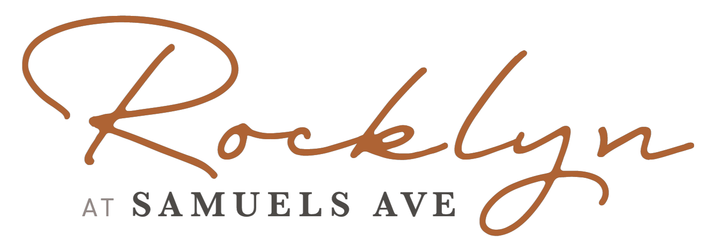 A logo with the word "Rocklyn" written in cursive script.
