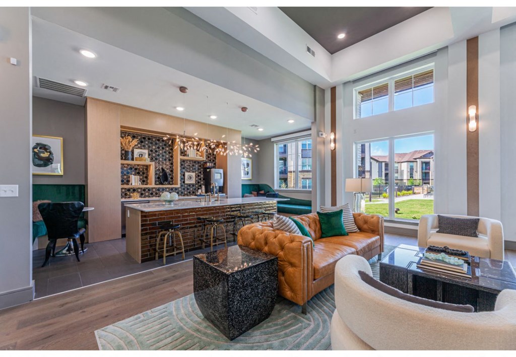 a living room with a bar and a couch
