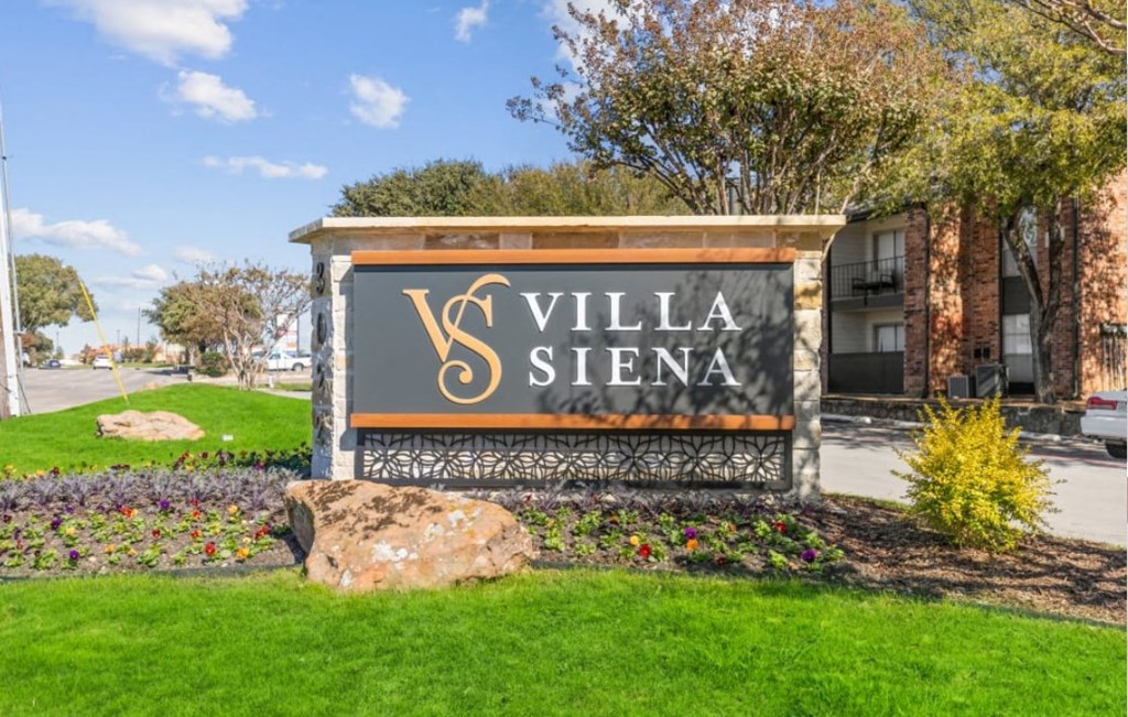 the sign for villa steena at the entrance of the building