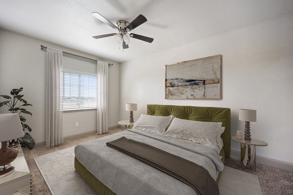 a bedroom with a ceiling fan and a window