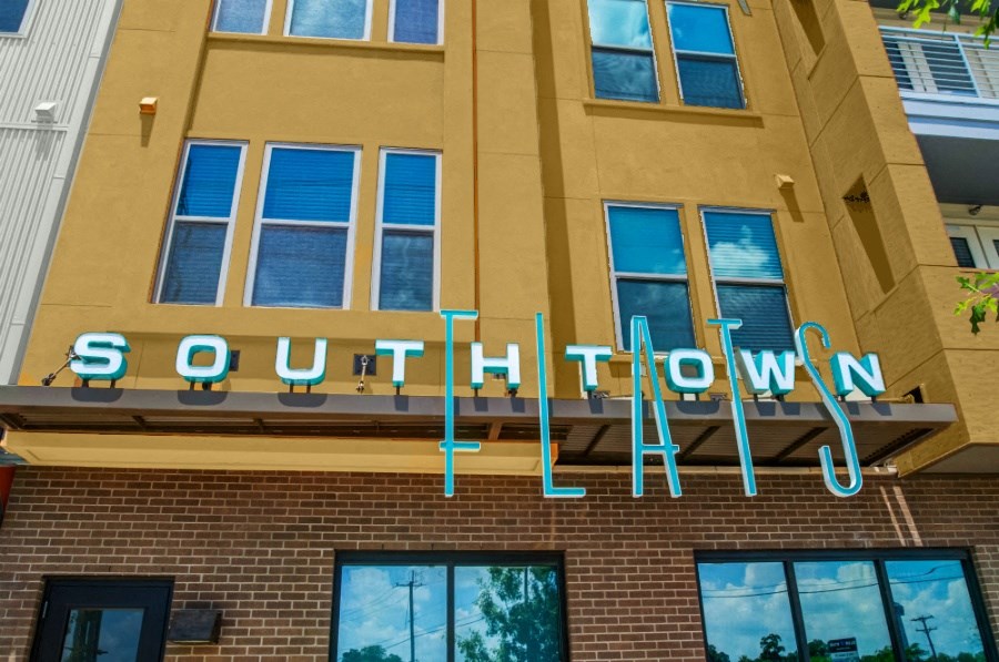 the sign for south town on the side of a building