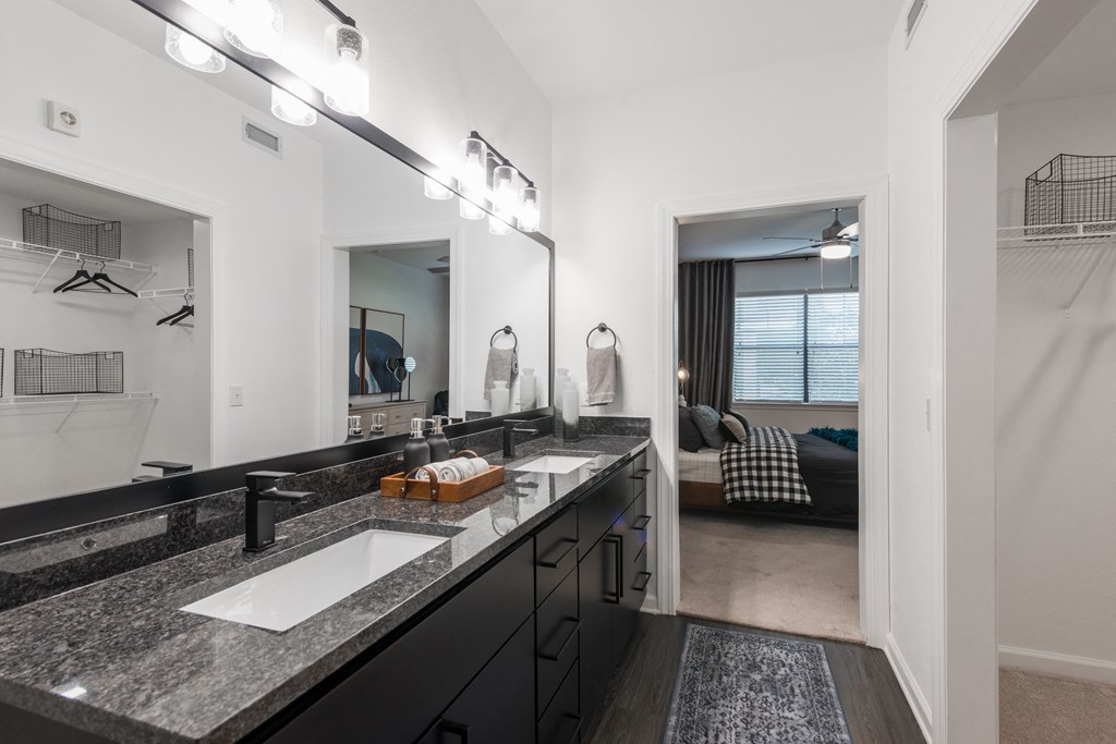 our apartments offer a bathroom with a shower and double sinks