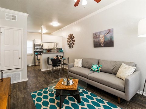 a living room with a couch and a table
