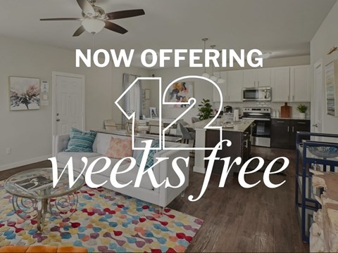A kitchen and living room with a "Now Offering 12 Weeks Free" sign.