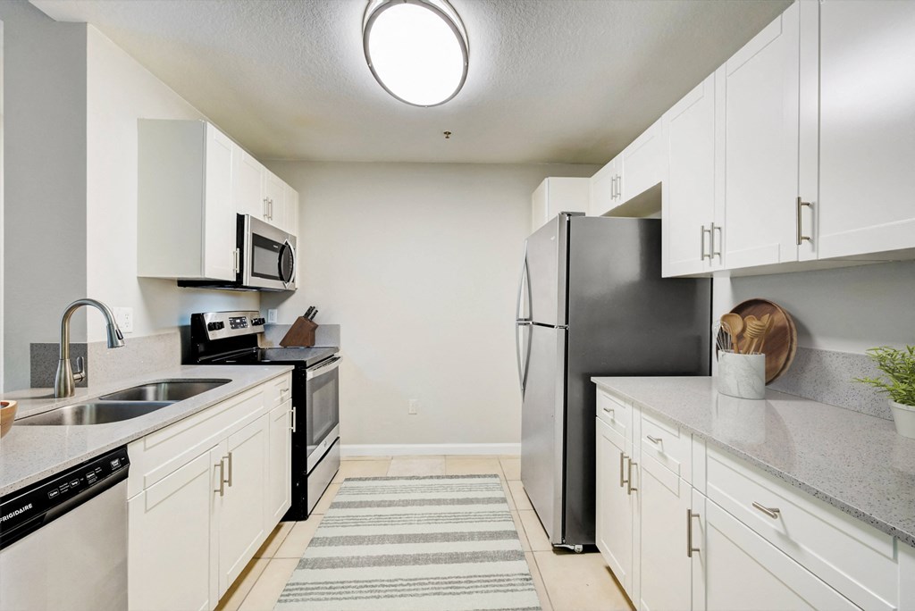 the preserve at ballantyne commons apartment kitchen with stainless steel appliances