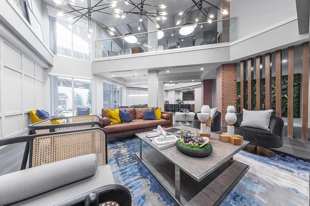 a living room with couches and a coffee table