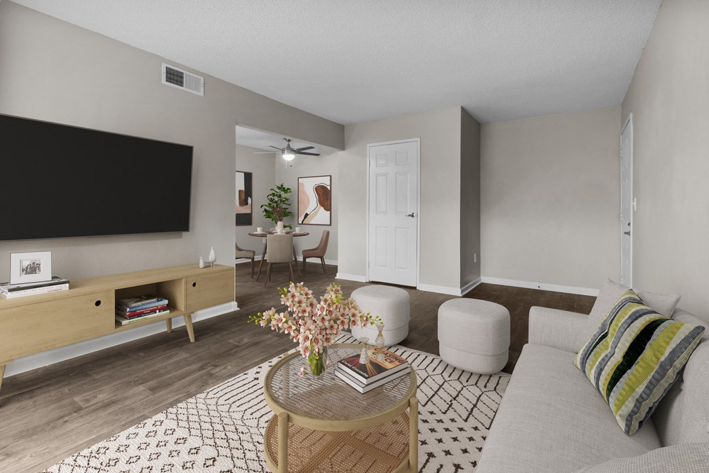 a living room with a couch and a table