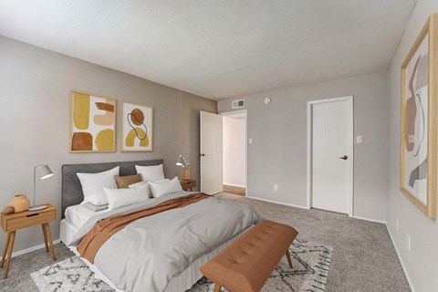 a bedroom with a large bed and a closet