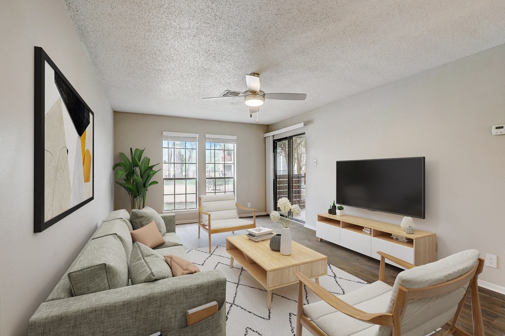 a living room with a couch and a tv