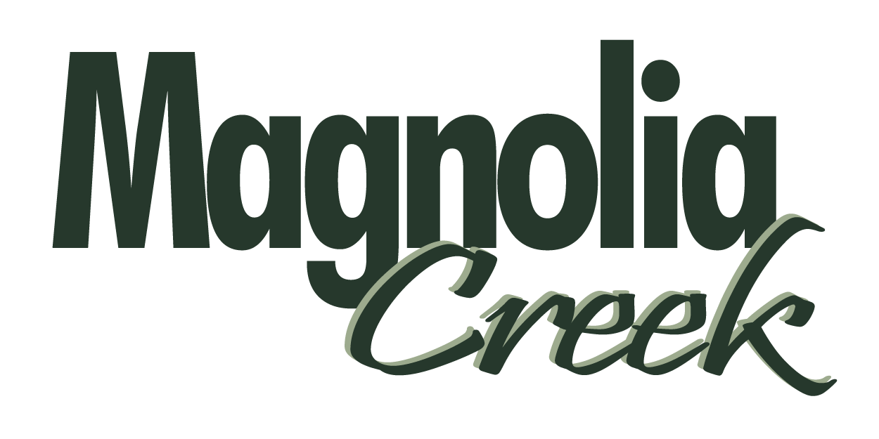 The image displays the text "Magnolia Creek" in a stylized font.