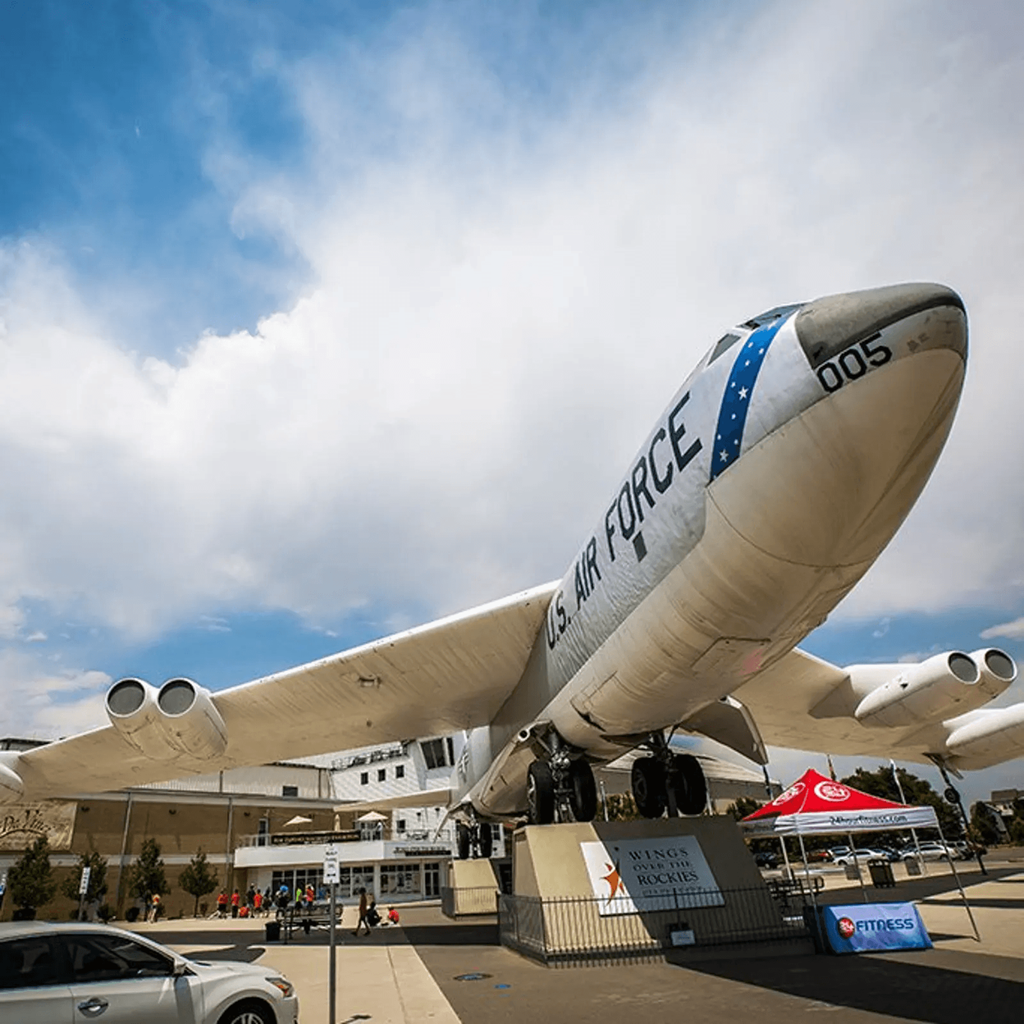 a large air force plane on display at an airport