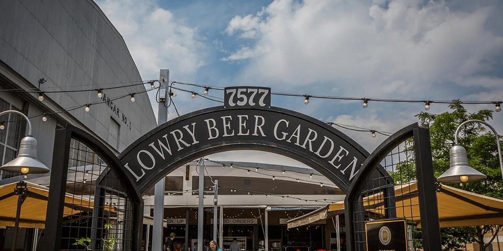 a sign that reads beer garden in front of a building