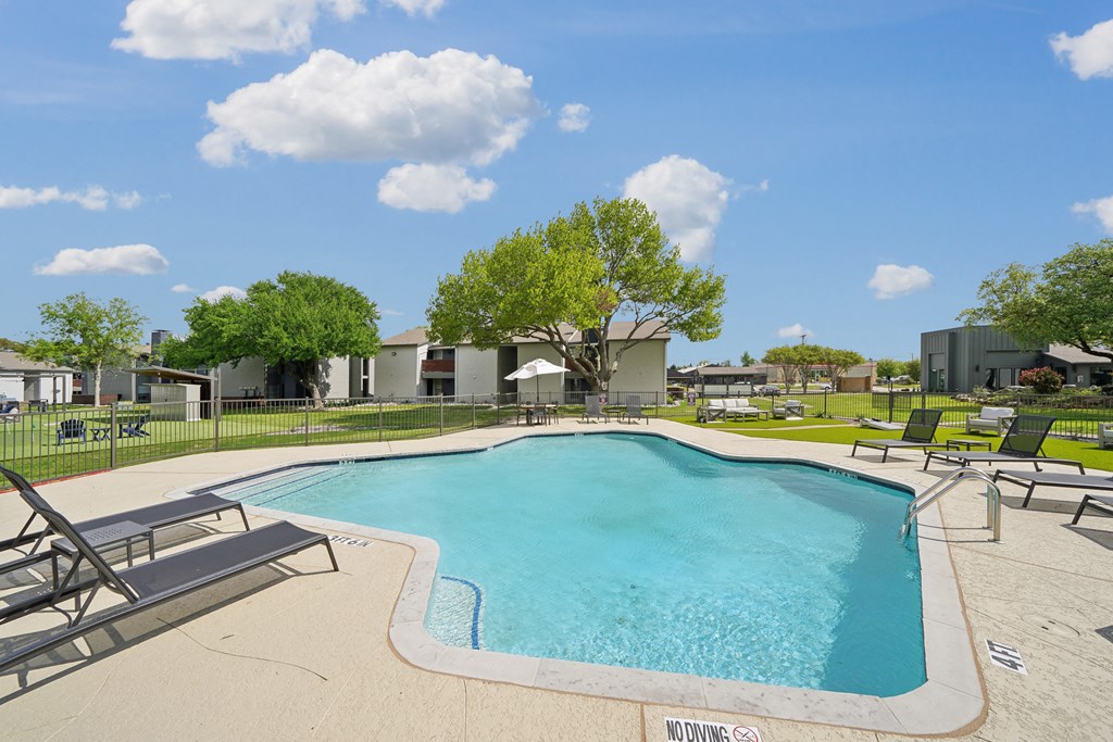 our apartments have a resort style pool with lounge chairs