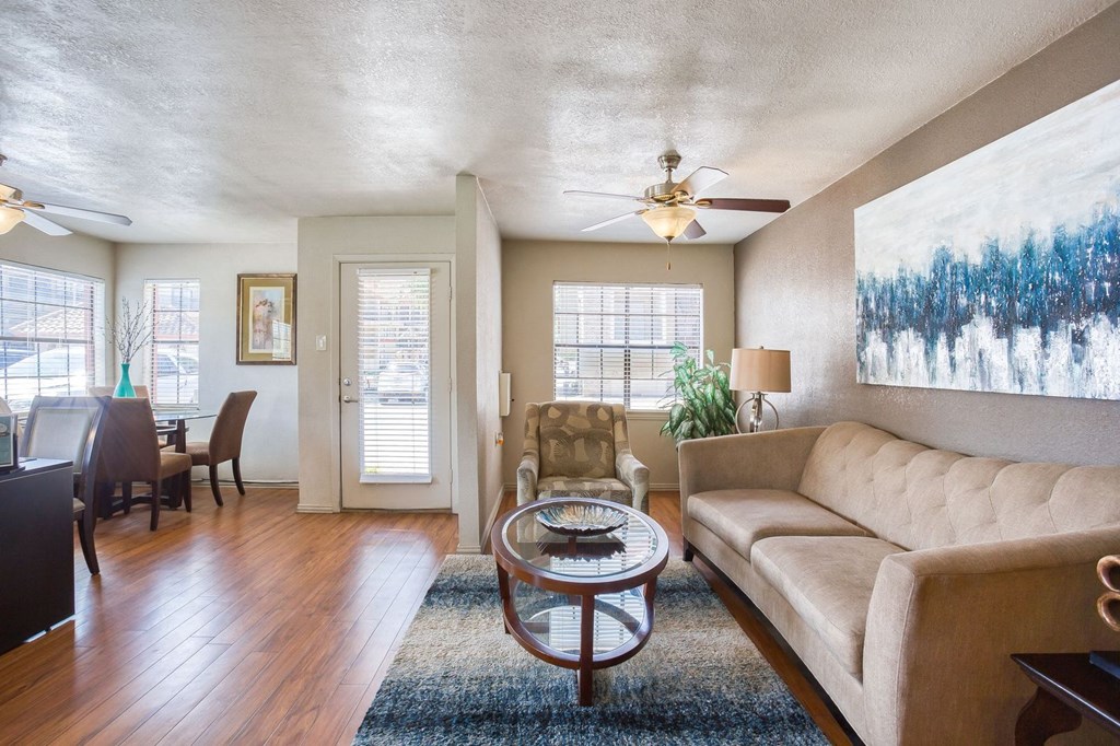a living room with a couch and a table