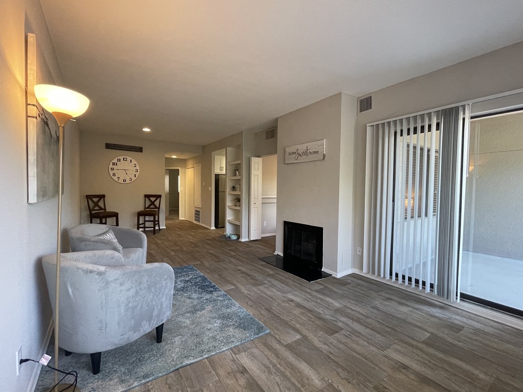 Living room at Augusta Court Apartments, Houston, TX, 77057
