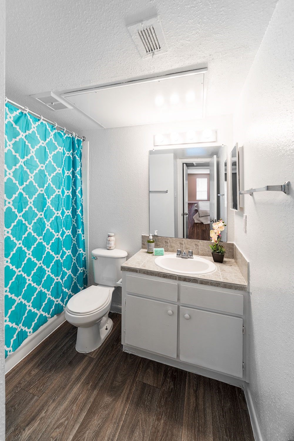 a bathroom with a toilet and a sink