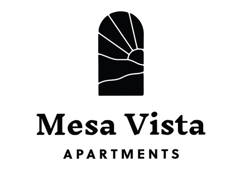 A black and white image of a building with the words Mesa Vista Apartments.