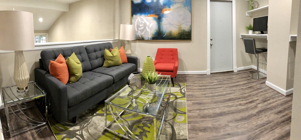 a living room with a couch and a coffee table