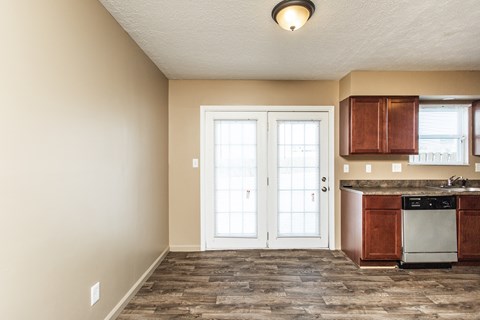 A kitchen with a dishwasher and a sink.