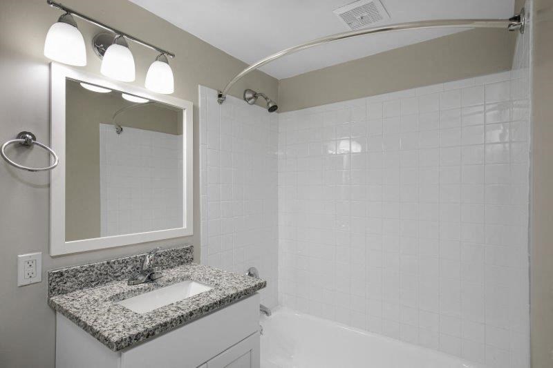 Renovated Bathroom with Granite Countertops