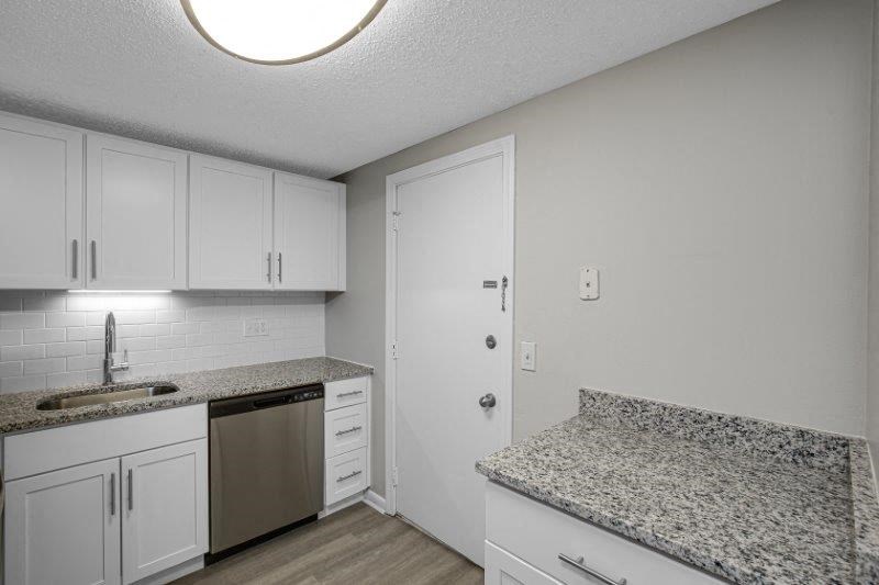 Renovated Kitchen with Granite Countertops & Stainless Steel Appliances