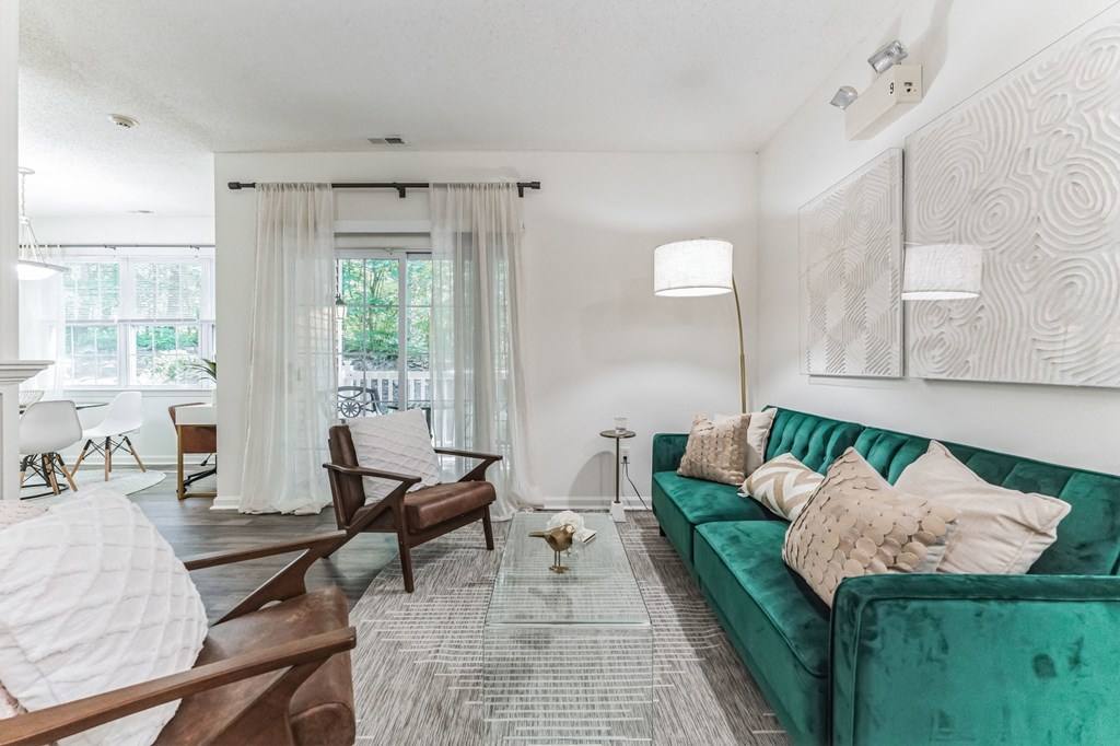 living room with a green couch at Cumberland Crossing, Cumberland, 02864