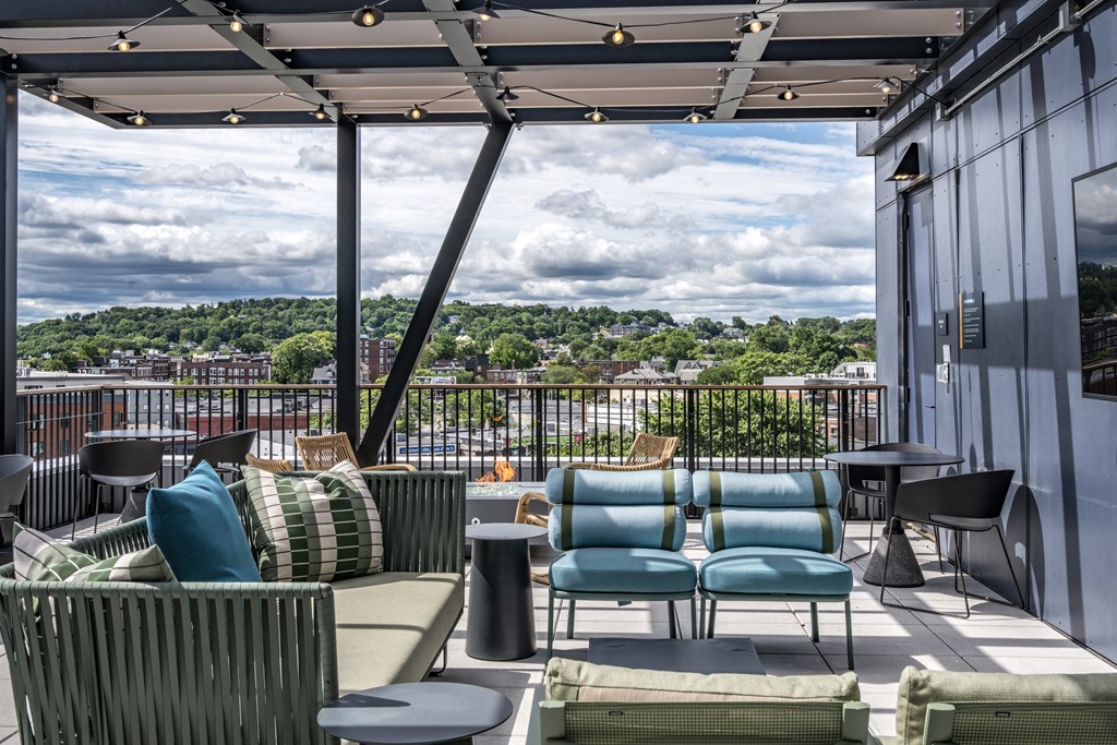 A patio with a view of the cityscape.