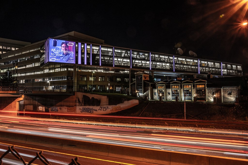 Corner of WGBH billboard lit up at The Indie, Boston, MA  