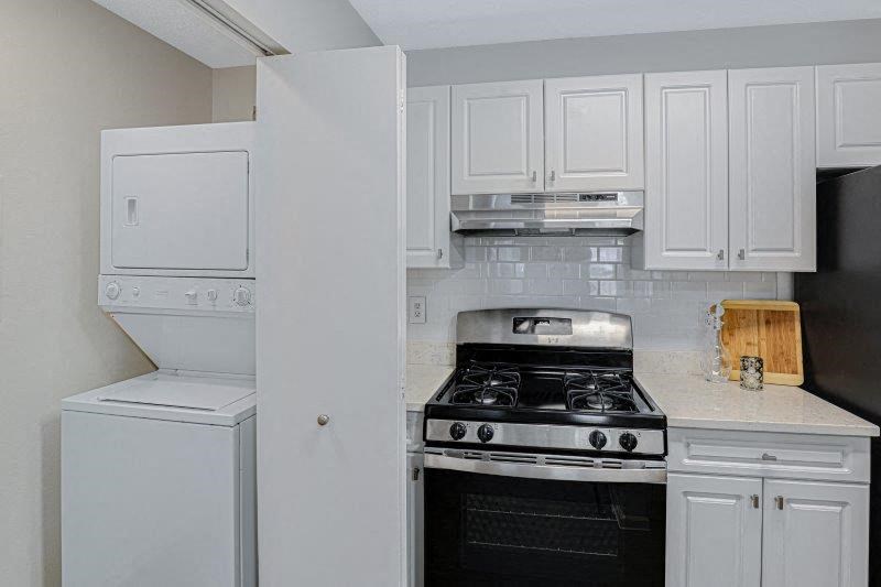 1 BED - 1 BATH | Kitchen/Washer & Dryer at Town Walk at Hamden Hills, Connecticut, 06518
