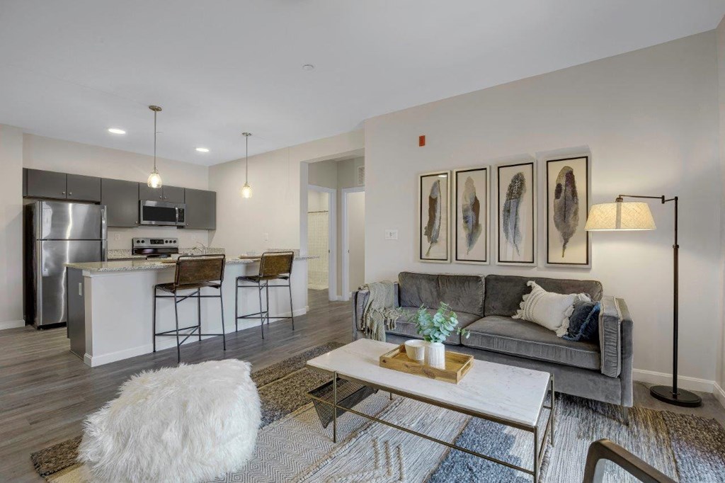 Bedroom view into kitchen at 21 East Apartments, North Attleboro, MA