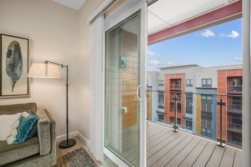 Living Room With Balcony at 21 East Apartments, Massachusetts, 02760