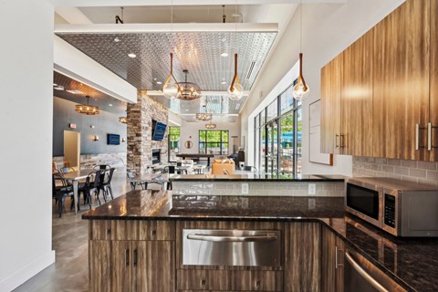 a kitchen with a counter top and a microwave at The Tannery, Glastonbury