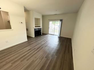 Renovated apartment living room with hardwood floors at Cumberland Crossing, Cumberland, RI, 02864